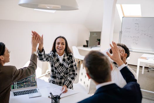 Women in tech celebrating a successful project