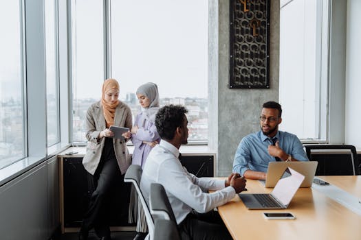 Women collaborating in a tech workspace