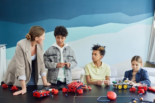 group of girls engaged in a STEM project