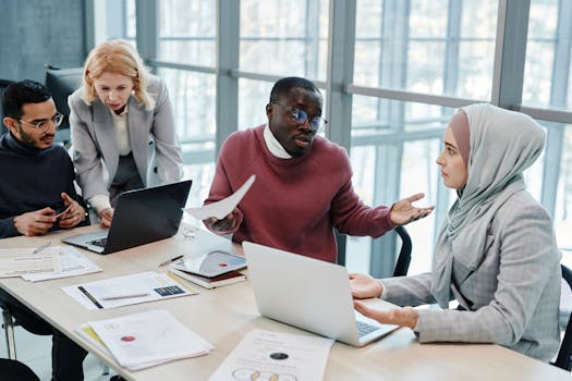 Women collaborating in a tech workspace