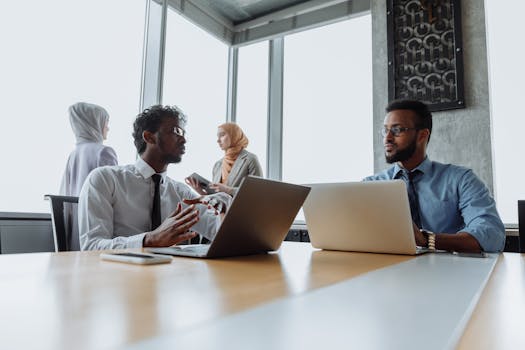 Women collaborating in a tech workspace