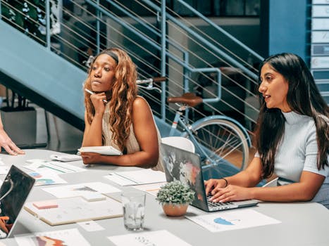 team of diverse women in tech brainstorming