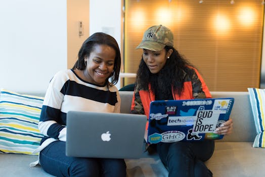 women collaborating on programming