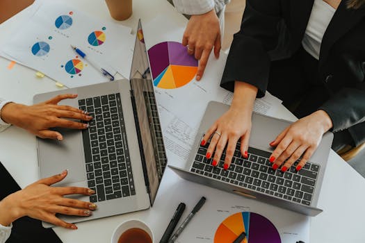 women collaborating in a tech office