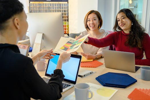 women collaborating over technology