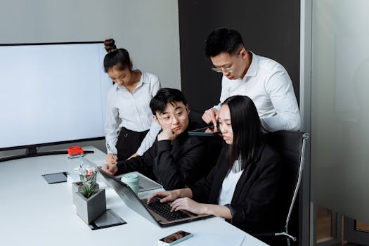 group of women discussing tech projects