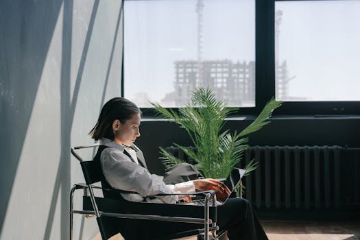 image of a woman happily working in a tech environment