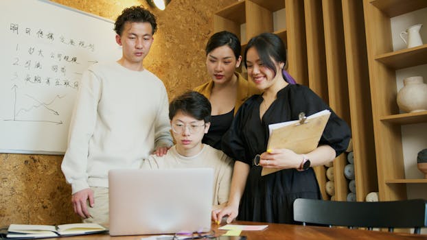 group of women collaborating on a tech project