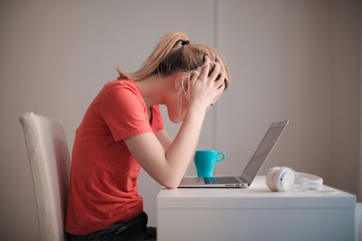 woman studying with a laptop